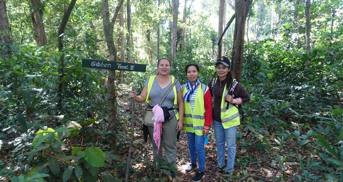 Women standing at the Gibbon Trail at Jahoo ecotourism camp