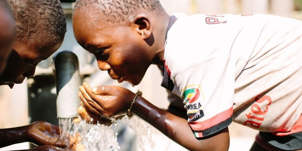 children drinking clean water