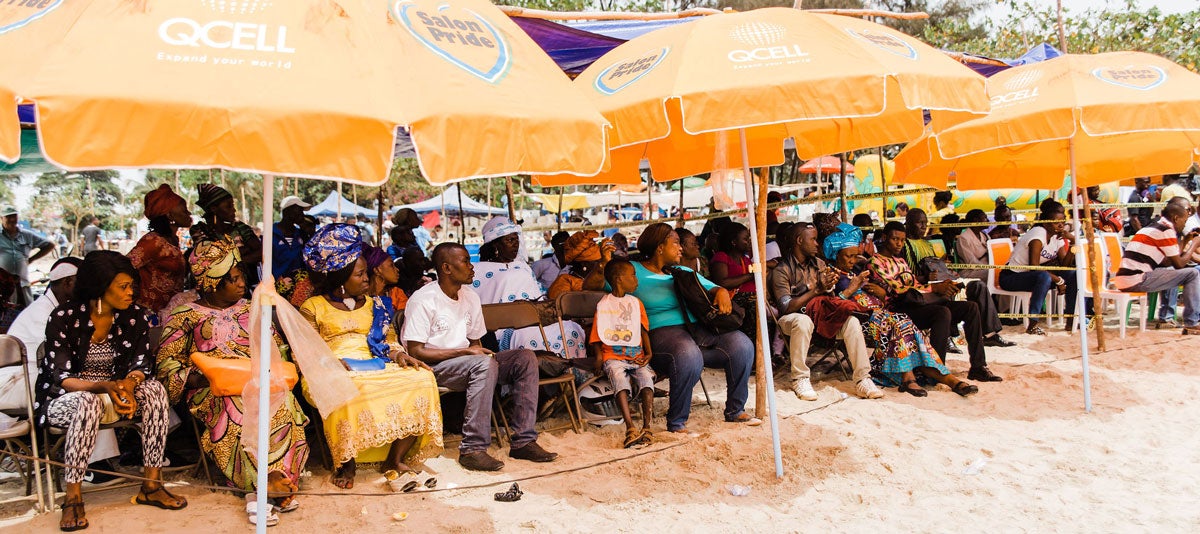 Families on the beach at beach day Sierra Leone