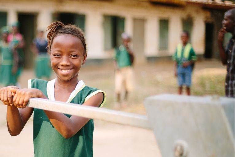 Girl at a well