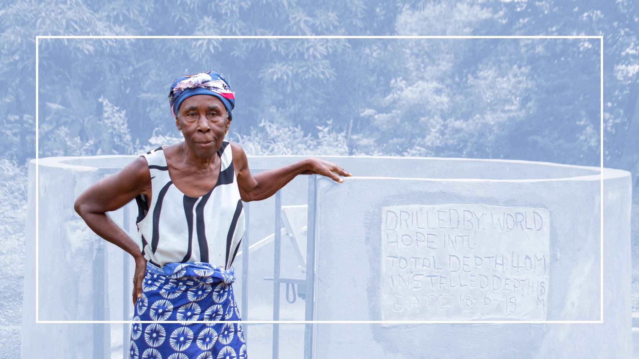 Woman standing by deep borehole well