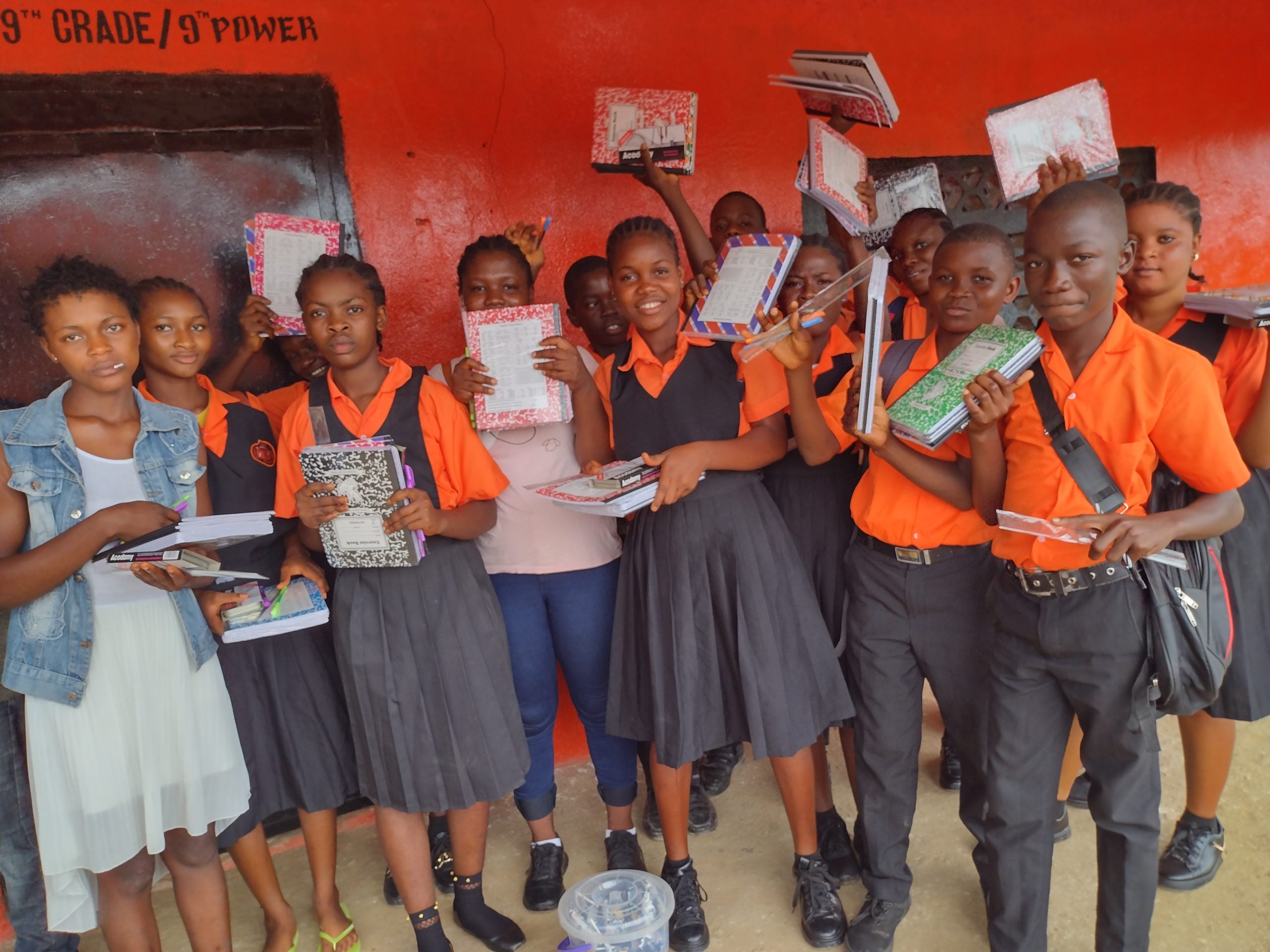 school kids with school supplies in Liberia