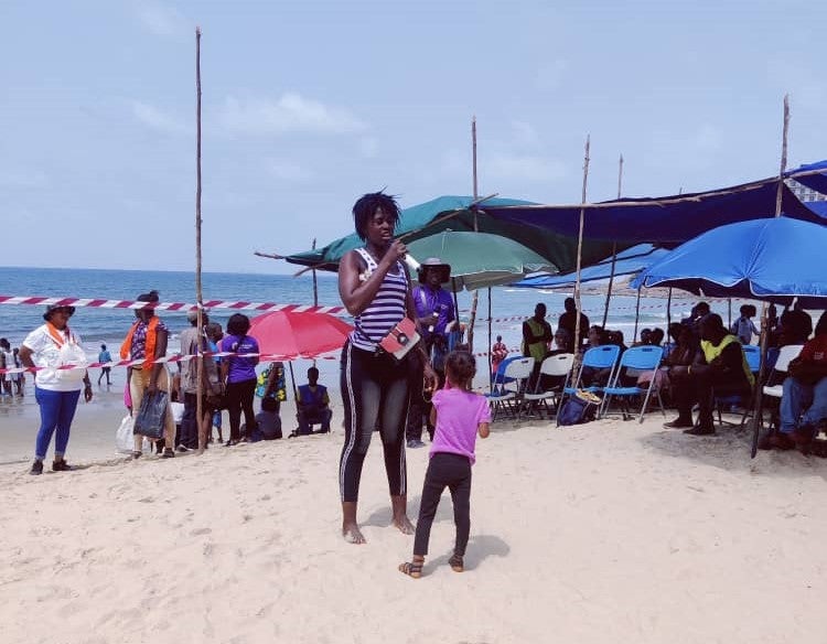 Mother and daughter with disabilities at the beach