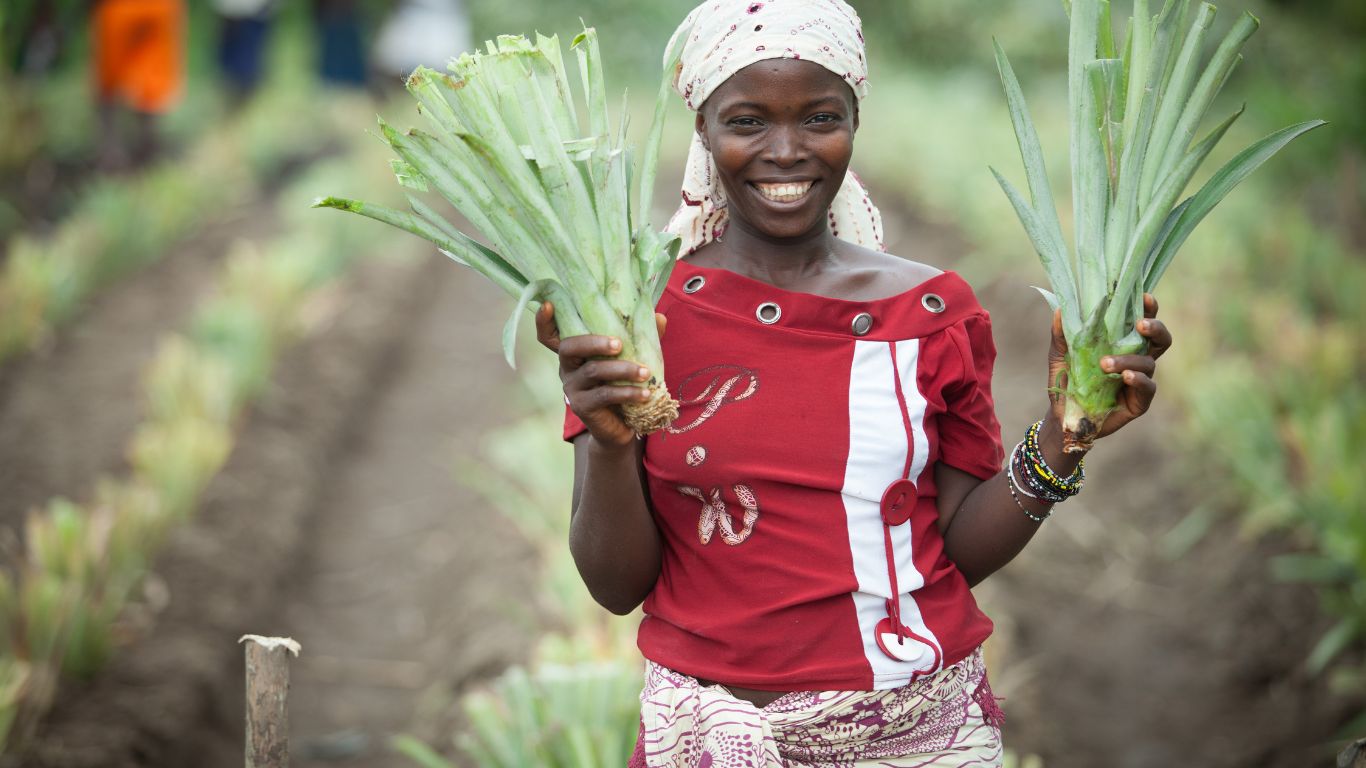 Woman holding farming produce