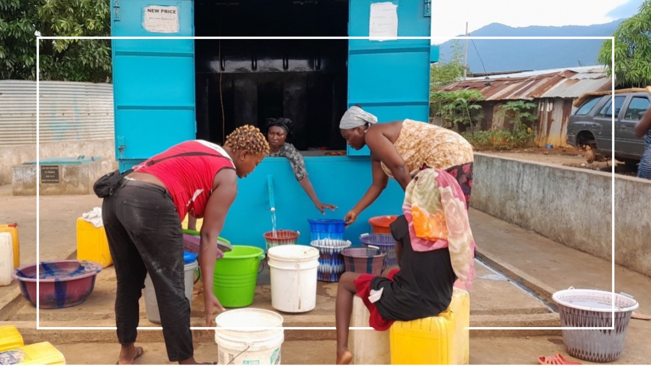 Women at a water kiosk in Sierra Leone