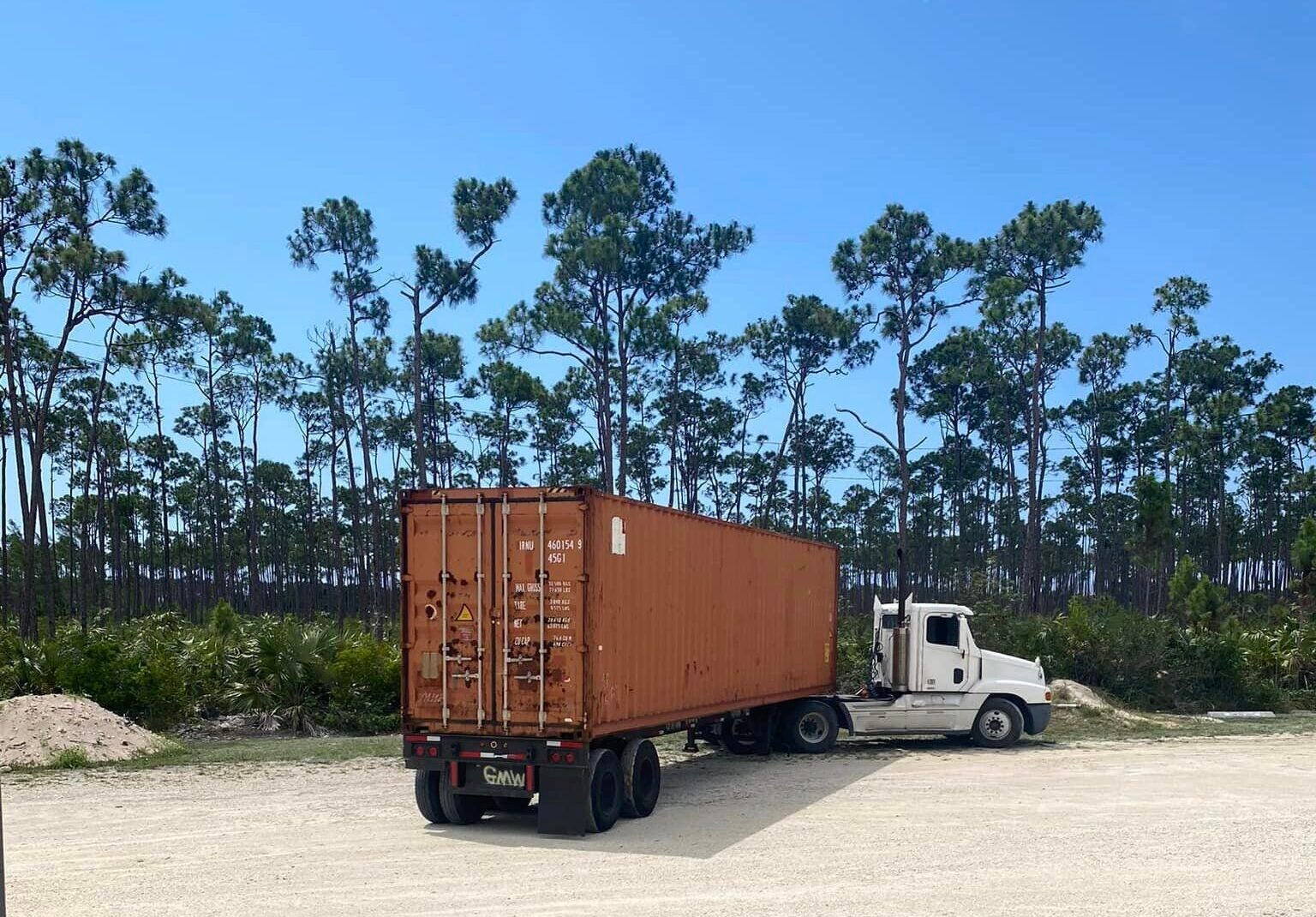 Shipping container of household supplies