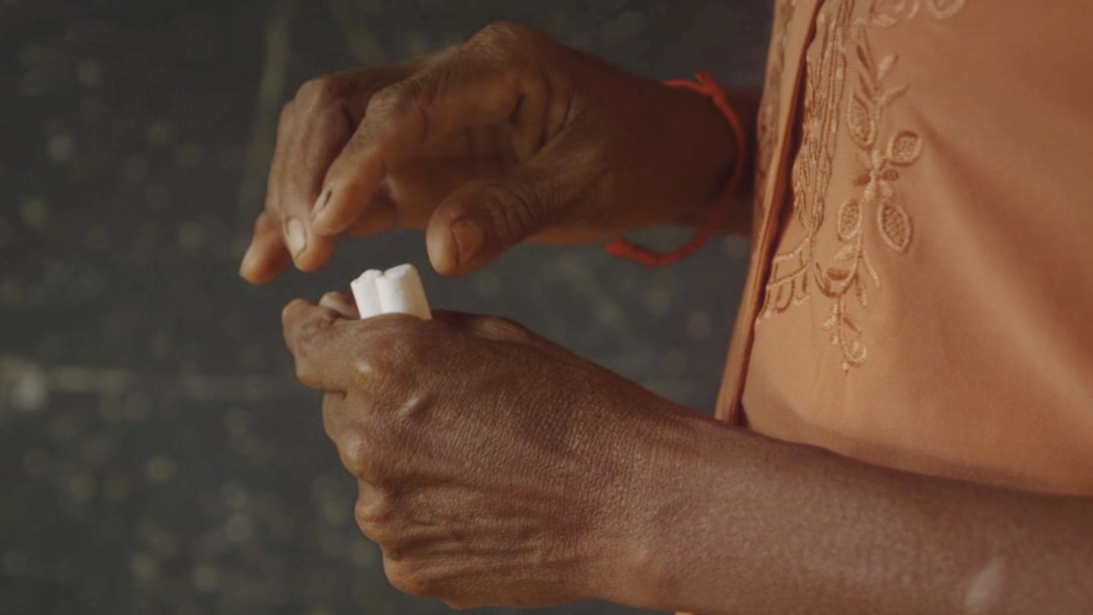 Adult hands holding chalk