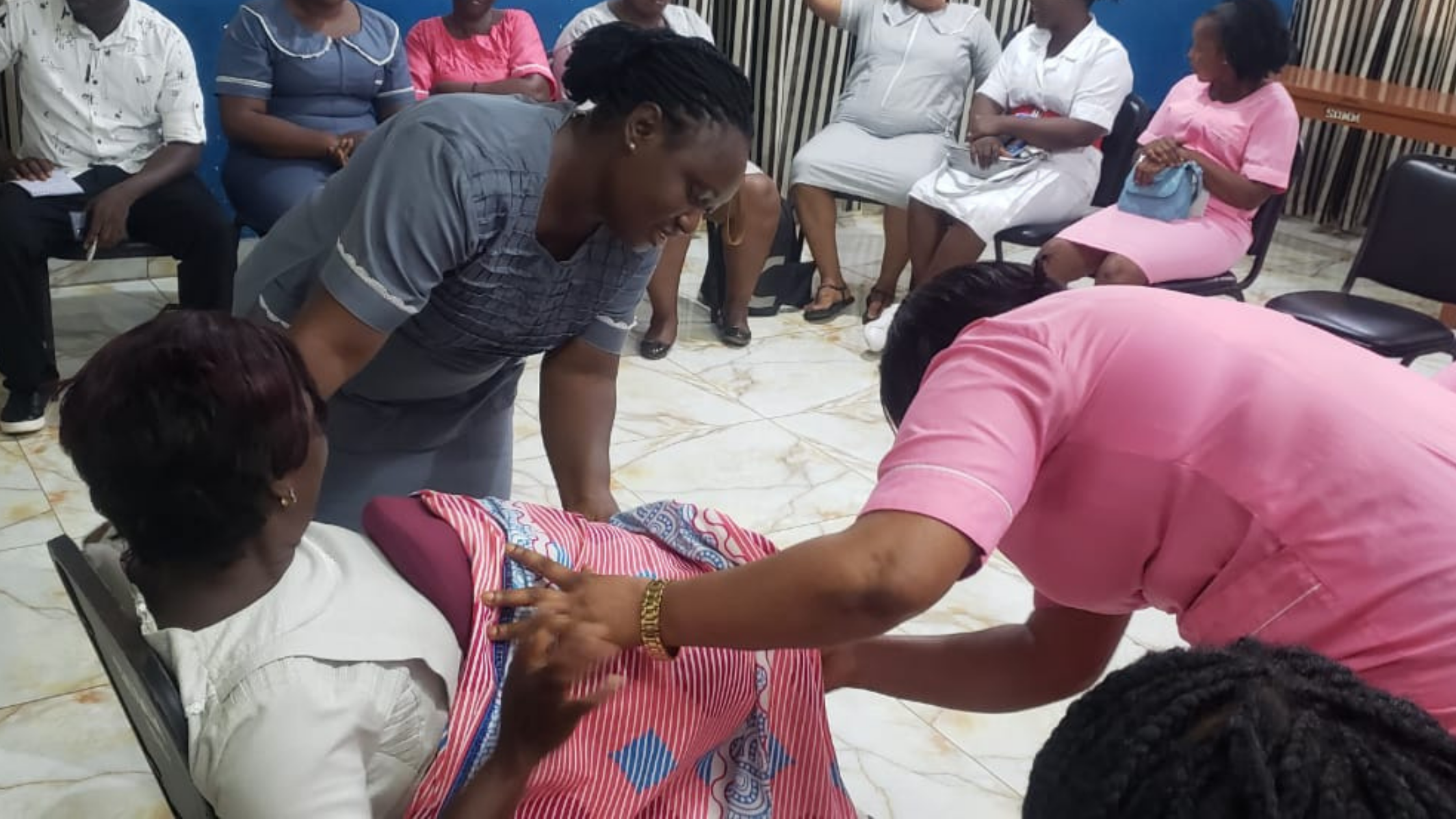 Healthcare workers training on birthing process