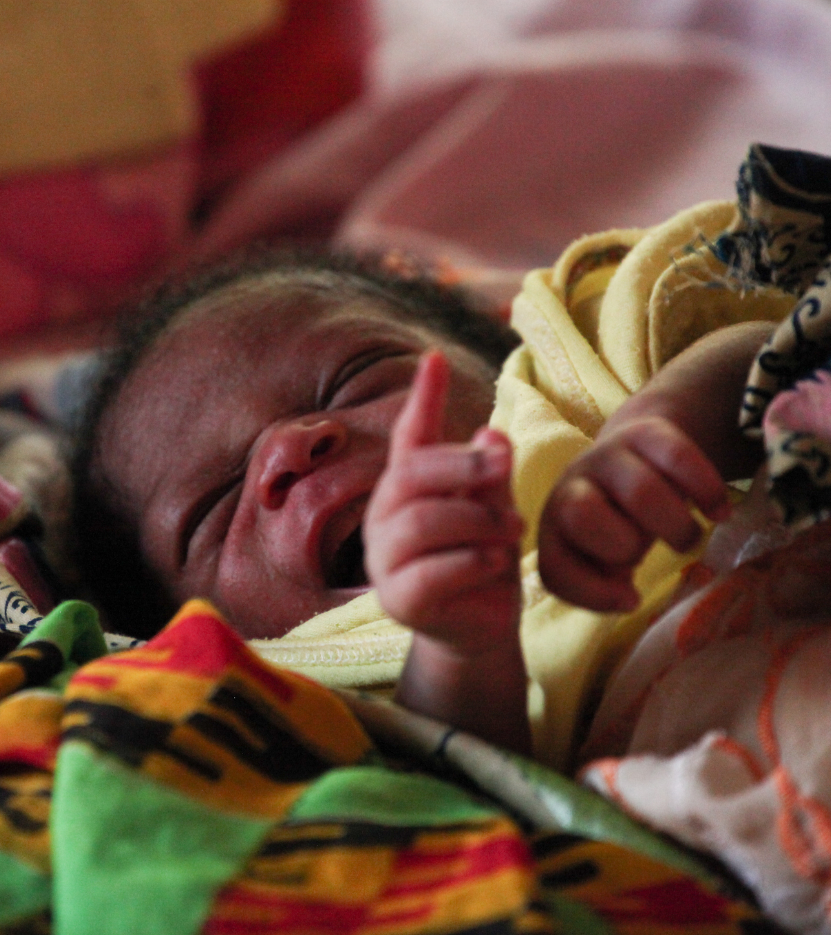 Newborn baby swaddled