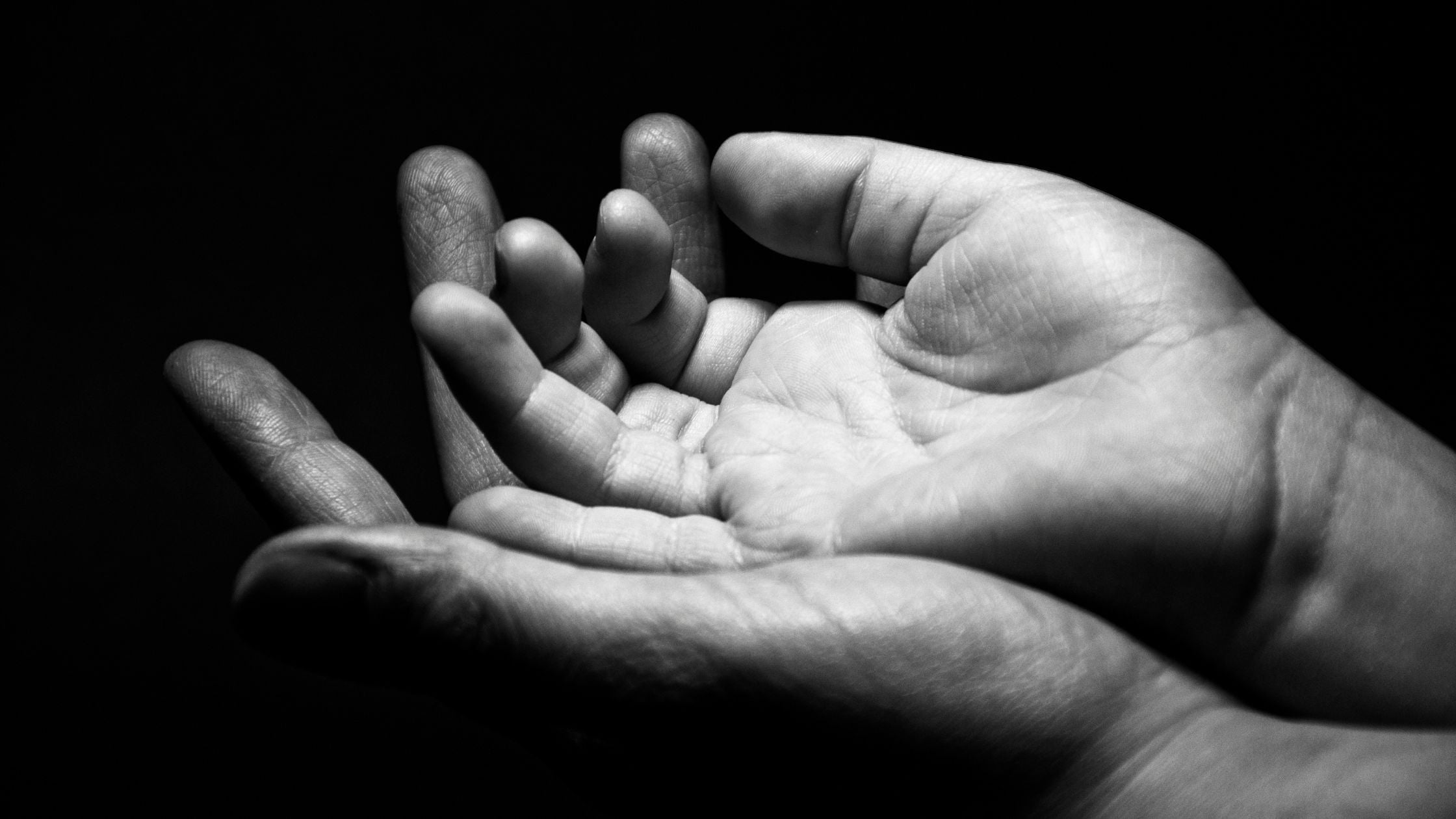 A Simple Yes (1) hands placed on top of each other facing upwards