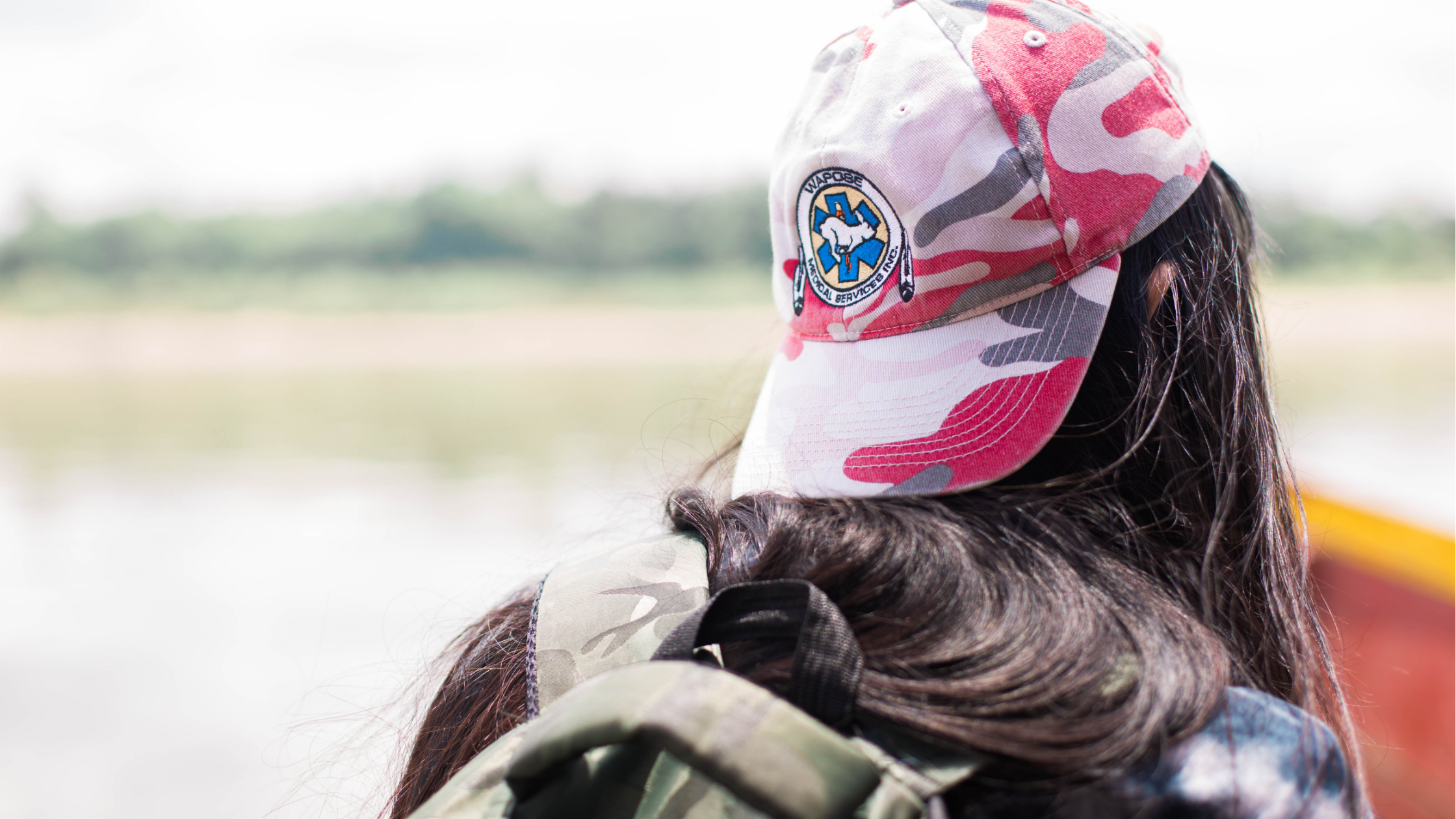 A Journey to Joy a girl wearing a hat from behind