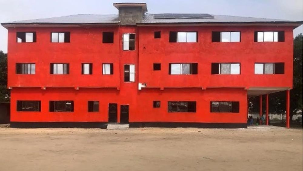 orange 3 storey school in Liberia