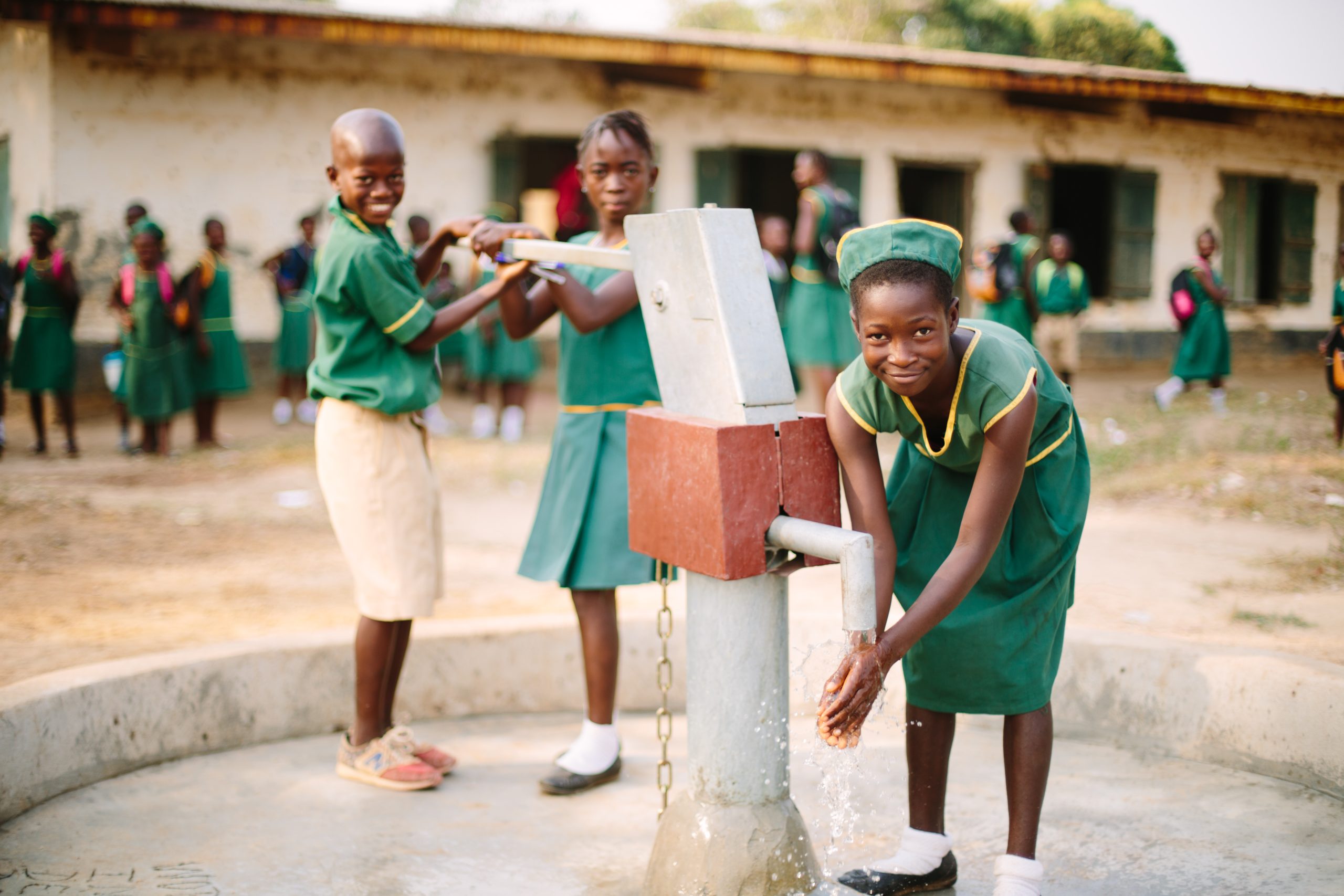 Children at a well at their school