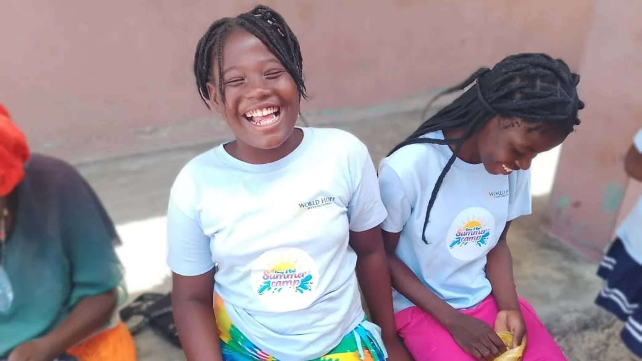 Two girls from Haiti who attended Come and Rest camps.